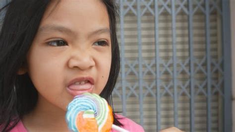Asian Girl With Lollipop stock videos and footage.